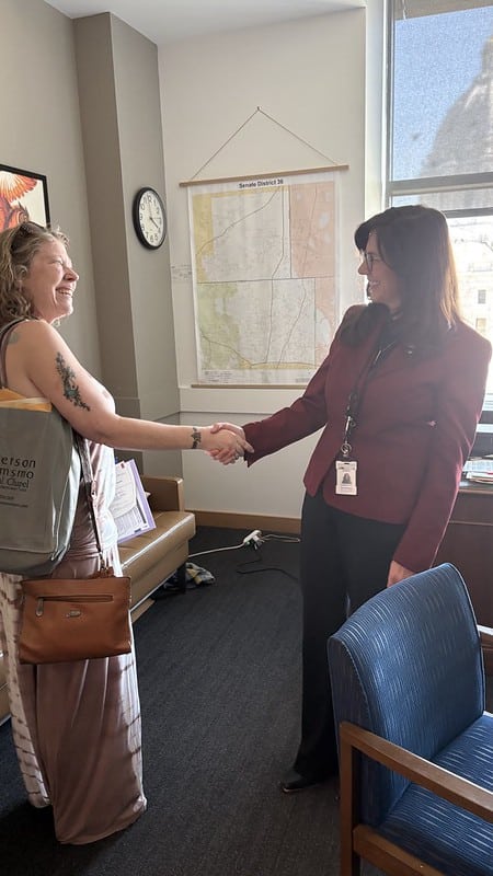 Day at the Capitol attendee  meets with legislator 